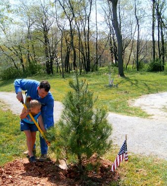 Daughter Brittany and I dedicating a tree to our  POWs and MIAs at our Veterans Memorial within Codorus State Park.